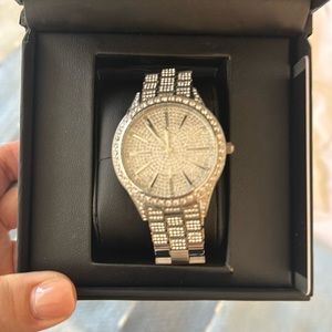 JB women’s silver diamonds on the hour marker watch